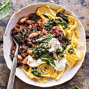 full color photograph of Slow-Cooker Tuscan Beef and White Bean Ragù from pg 193